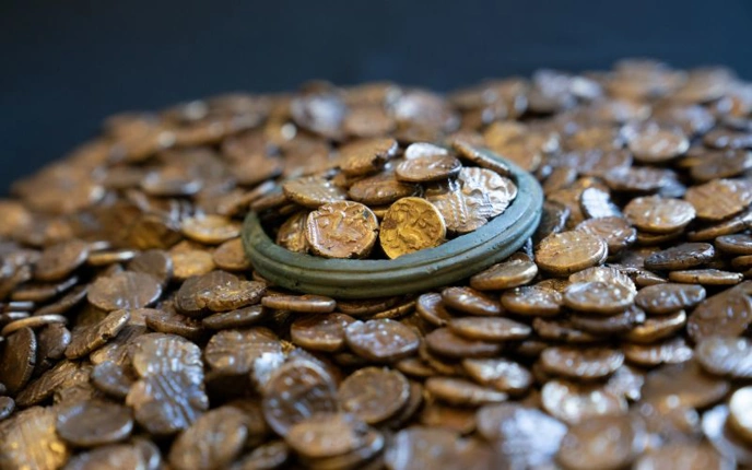 Pile of small gold coins